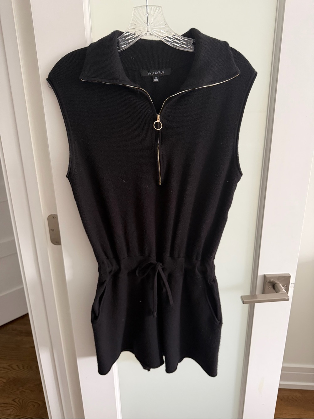 Sleeveless Black Knit Zip-Front Romper with Drawstring Waist